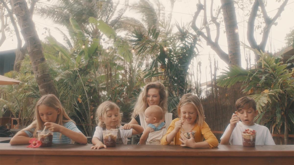 Mom with 5 kids at Acai bowl shop video